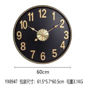 black wall clock with gold accents and industrial charm