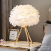 feather glow luxe lamp – luxury feather table lamp with golden tripod base