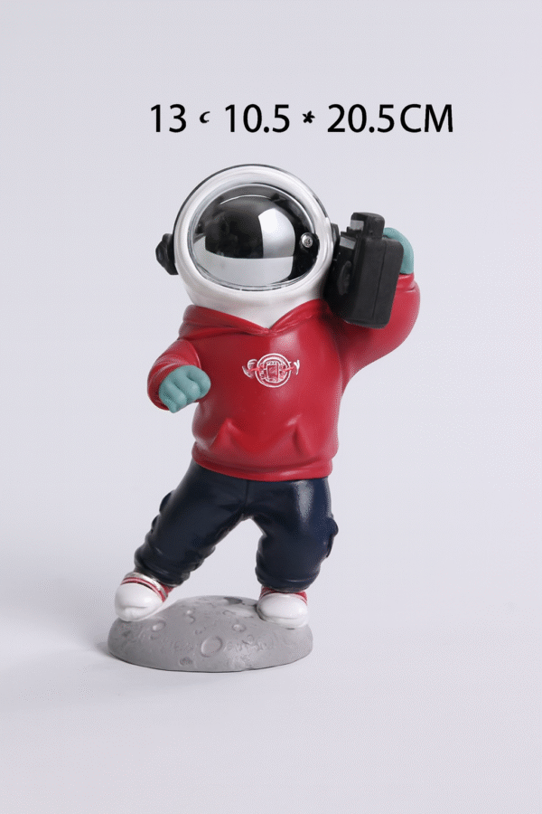 casual astronaut sculpture – red & blue design on lunar base casual astronaut sculpture – red & blue design on lunar base