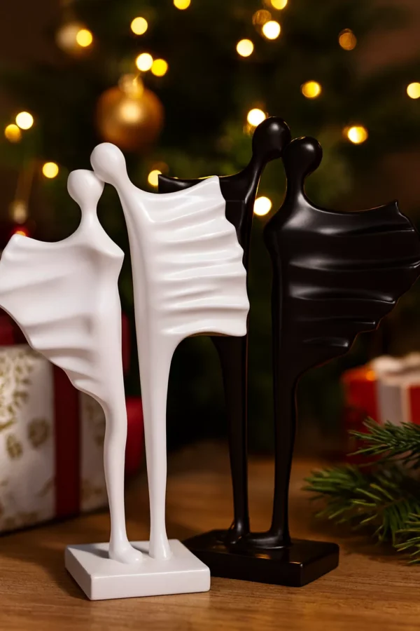 abstract couple sculptures – elegant black & white standing duo abstract couple sculptures – elegant black & white standing duo