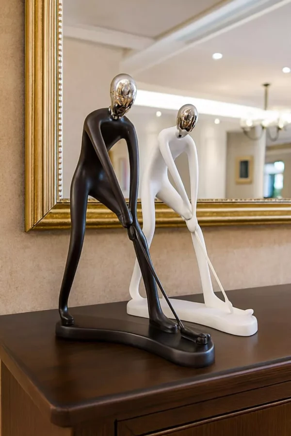 abstract-golf-player-sculptures-elegant-black-white-duo-00 Abstract Golf Player Sculptures – Elegant Black & White Duo