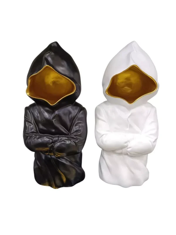 abstract space sculptures – standing black & white duo with golden hood accents abstract space sculptures – standing black & white duo with golden hood accents