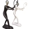 abstract tennis player sculptures – dynamic black & white duo