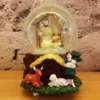 christmas snow globe decoration – nativity scene with holy family and rustic base