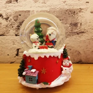 christmas snow globe decoration – three snowmen with tree on festive red base