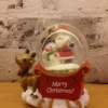 christmas snow globe – elegant red sleigh with santa & snowman figurines