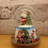 christmas snow globe – santa & tree scene with colorful train and gift filled sleigh base