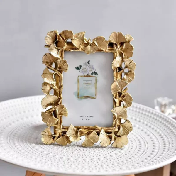 decorative photo frame with golden leaf design decorative photo frame with golden leaf design