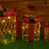 illuminated golden christmas gift boxes – trio set with red ribbon accents