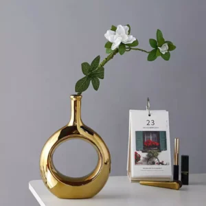 hollow oval gold ceramic vase