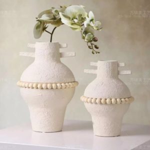 white ceramic vase duo with beaded accent