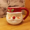 santa ceramic mug – 3d festive face with holly accent