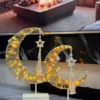 decorative crescent light with wooden star & tassel – elegant festive design