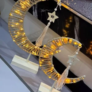 decorative crescent light with wooden star & tassel – elegant festive design