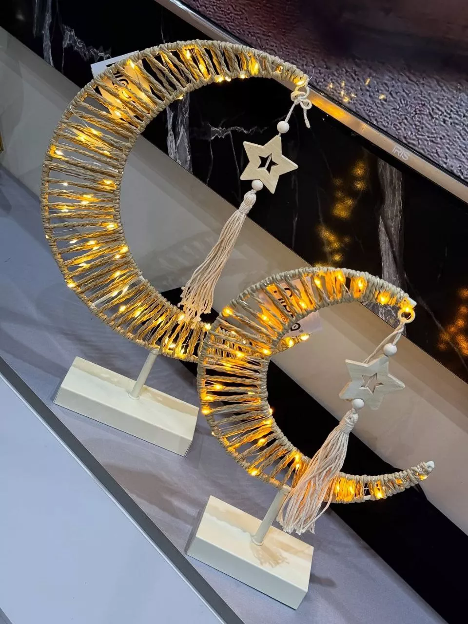 decorative crescent light with wooden star & tassel – elegant festive design