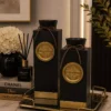 premium black & gold rectangular vase set two piece luxury boutique table accent with embossed emblem