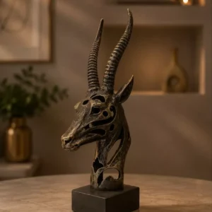 Home bronze antique gazelle head sculpture with cutout detail on black base