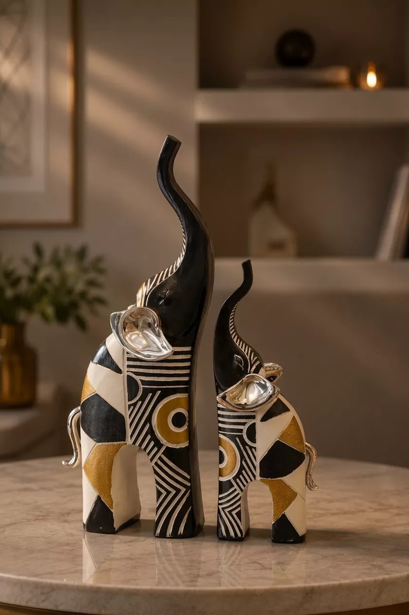 set of 2 geometric african elephant statues in black gold and silver