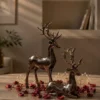 set of 2 metallic reindeer statues with glossy finish for tabletop decor